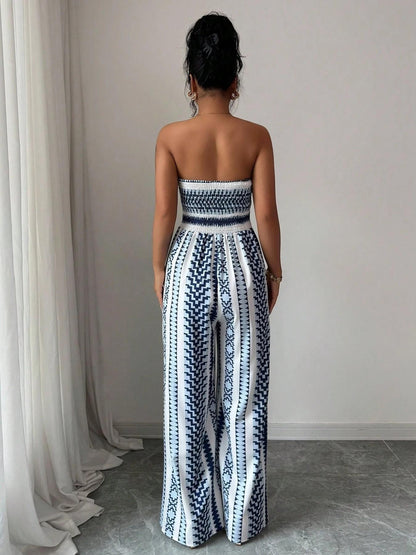 ✨👗 Macacão feminino geométrico com decote halter e fenda lateral – elegante e moderno