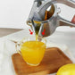 🍹 Espremedor de Frutas Manual em Aço Inoxidável – Suco Fresco, Saudável e Fácil de Preparar