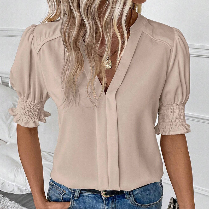 Blusa feminina elegante com decote em V e mangas bufantes