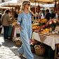 👗✨ Macacão feminino jeans de ombro à mostra com caimento largo que valoriza o corpo com estilo moderno