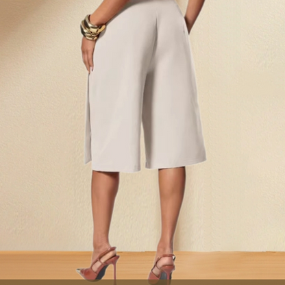 👖✨ Calça pantacourt de cintura alta com caimento elegante que alonga e valoriza a silhueta