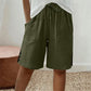 🩳✨ Shorts feminino de verão com cintura ajustável e detalhe elegante de botões laterais
