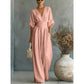 👗✨ Macacão feminino elegante com decote em V e cintura marcada que valoriza a silhueta