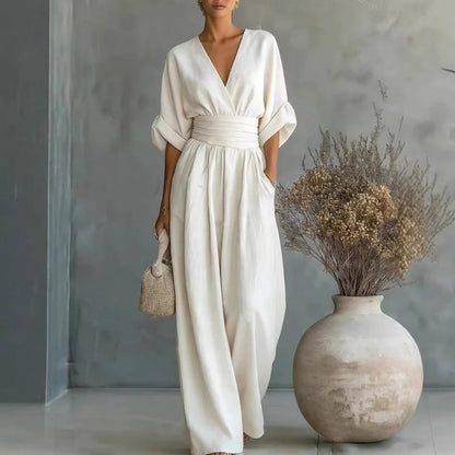 👗✨ Macacão feminino elegante com decote em V e cintura marcada que valoriza a silhueta