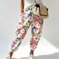 🌸👖 Calça feminina casual com estampa floral vibrante e cintura ajustável confortável