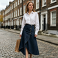 👖✨ Saia jeans feminina cintura alta – corte irregular moderno e estiloso