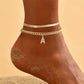 ✨💎 Tornozeleiras Femininas Douradas com Inicial Delicada em Camadas – Elegância, charme e estilo em cada detalhe