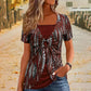 🐆✨ Camiseta Feminina com Estampa de Leopardo e Detalhe O-Ring – Estilo Moderno com Visual de Duas Peças