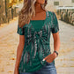 🐆✨ Camiseta Feminina com Estampa de Leopardo e Detalhe O-Ring – Estilo Moderno com Visual de Duas Peças