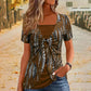 🐆✨ Camiseta Feminina com Estampa de Leopardo e Detalhe O-Ring – Estilo Moderno com Visual de Duas Peças